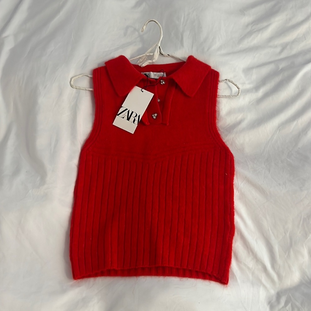 Red sweater vest